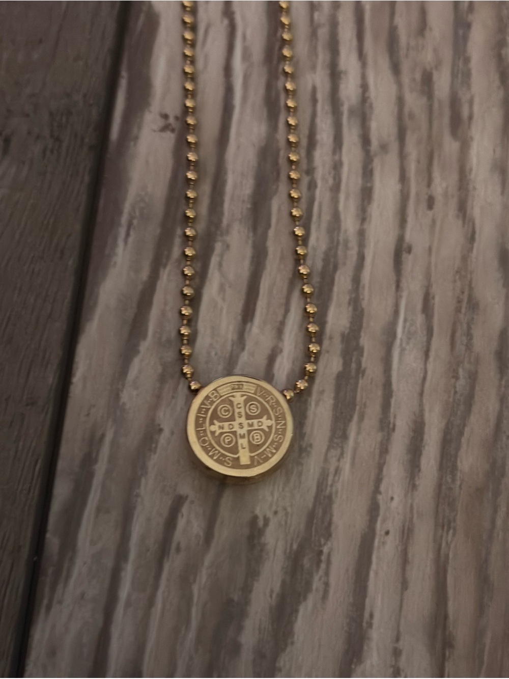 Necklace with reversible charm